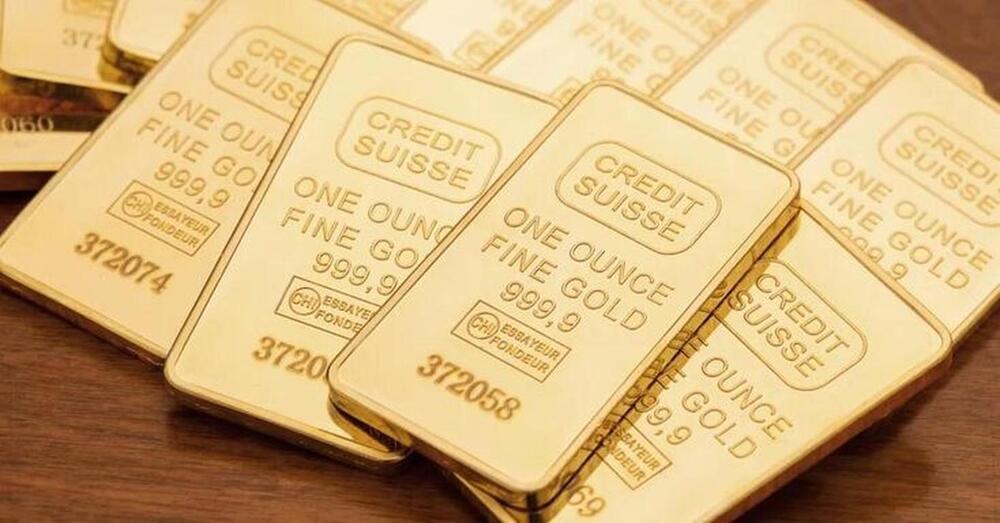 1 ounce vàng bằng bao nhiêu USD?